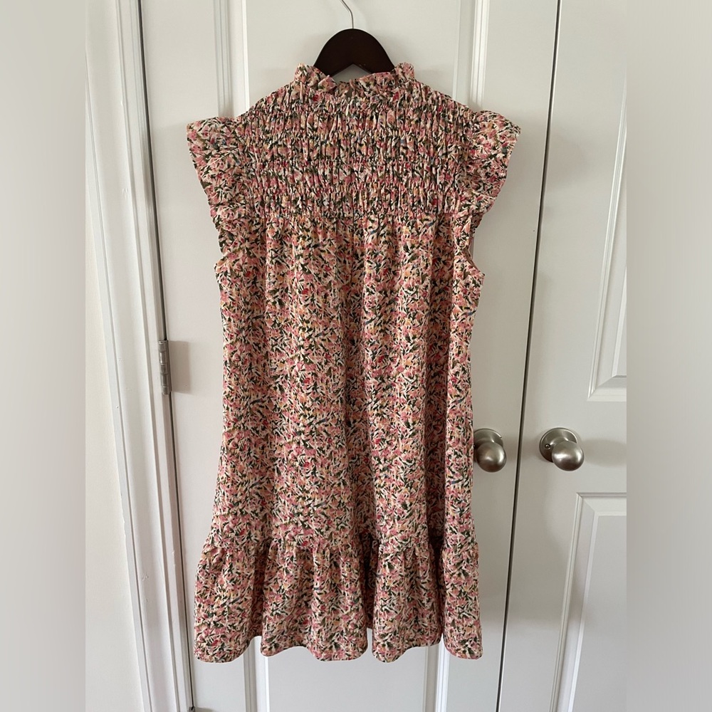 Moodie women’s size M blush pink floral flutter sleeve smocked dress.